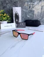 OAKLE_Y 4938 PRIZMA POLARIZED BLACK ORANGE GLASSES