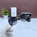 RAYBAN FERRARI 2030 GOLD BLACK SHADED GLASSES - Image 3