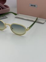 Miu.miu 90 Golden sea green