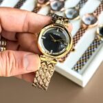 GUESS LADIES WATCH GOLD BLACK - Image 2